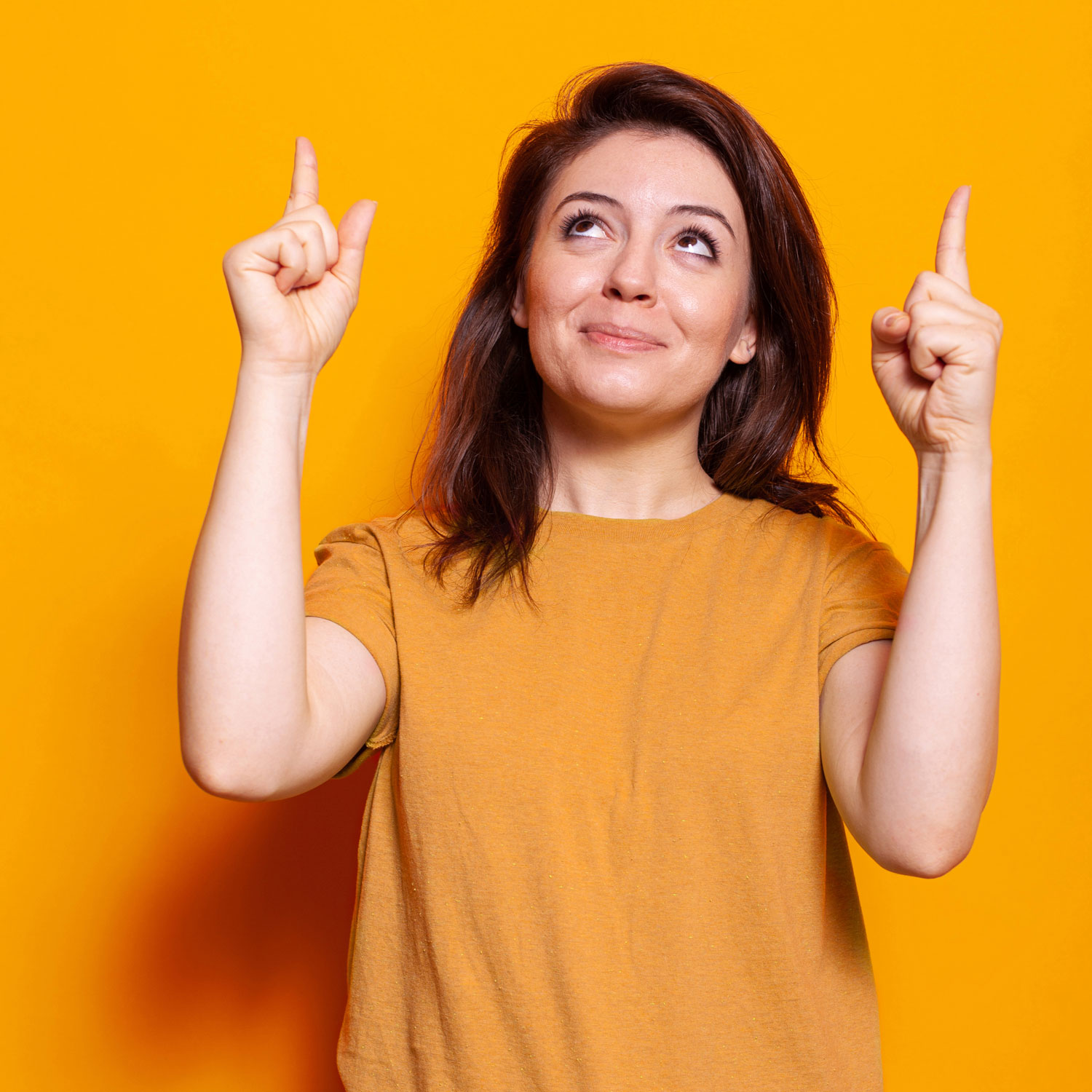 portrait-of-joyful-adult-pointing-index-fingers-up-2022-02-04-18-04-50-utc